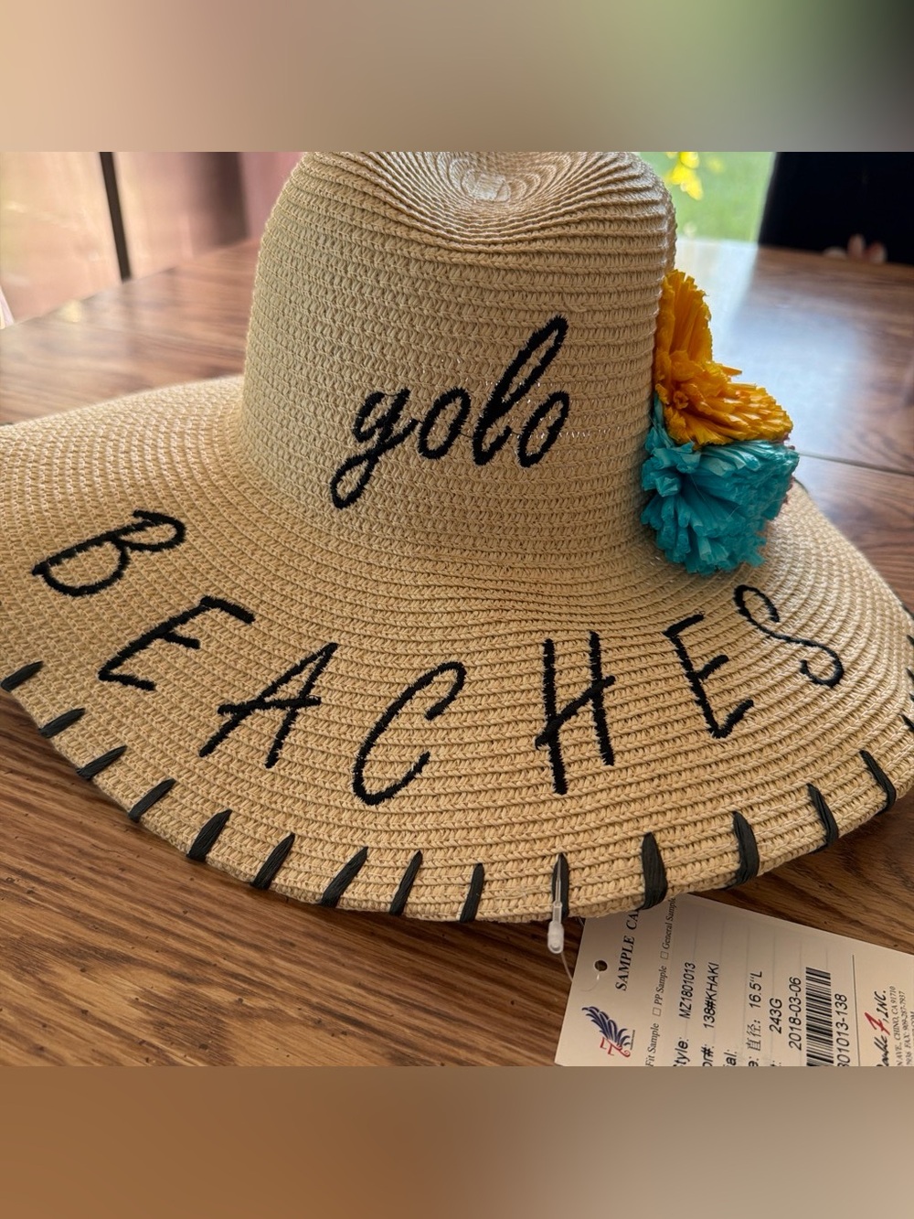 Straw Sun Hat with Yellow & Teal Flower Accent -